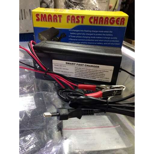 a box of cables with a box of charger.