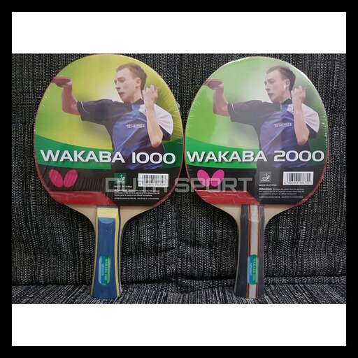two tennis rackets with a picture of a man in a blue shirt and a white shirt.