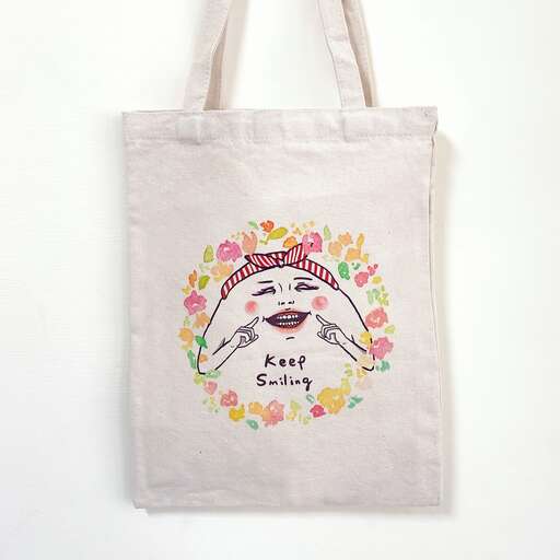 tote bag with a cute ladybug in a flowery print