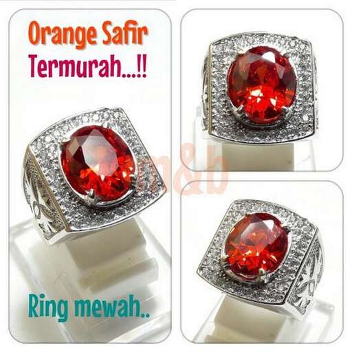 orange and red ring with a stone