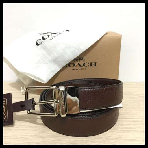 a belt with a leather belt and a pocket watch.