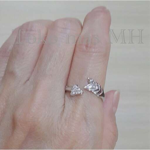 a diamond ring in sterling silver with a diamond.