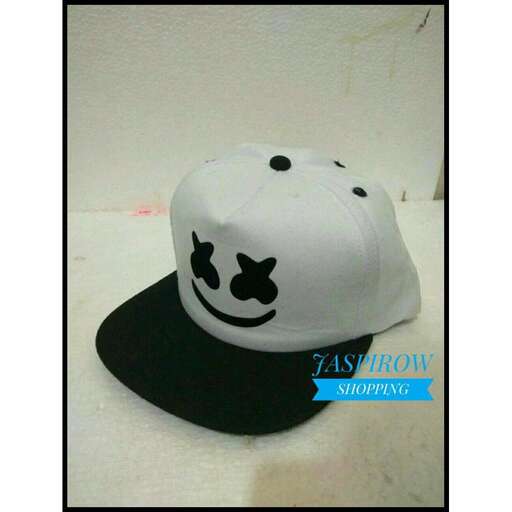 a white hat with a smiley face on it.