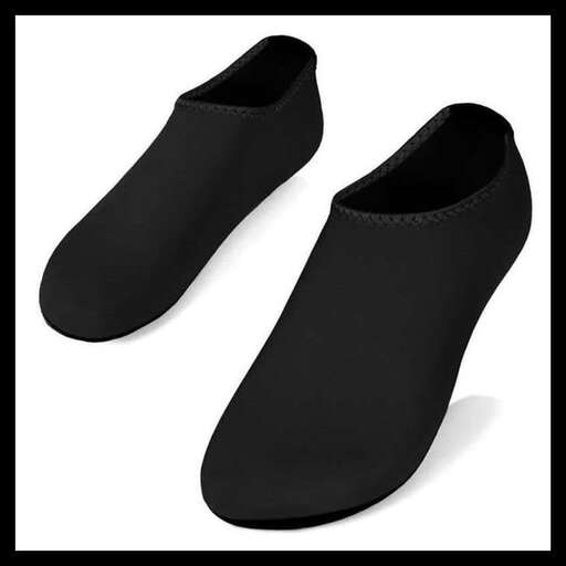 a pair of black flat shoes