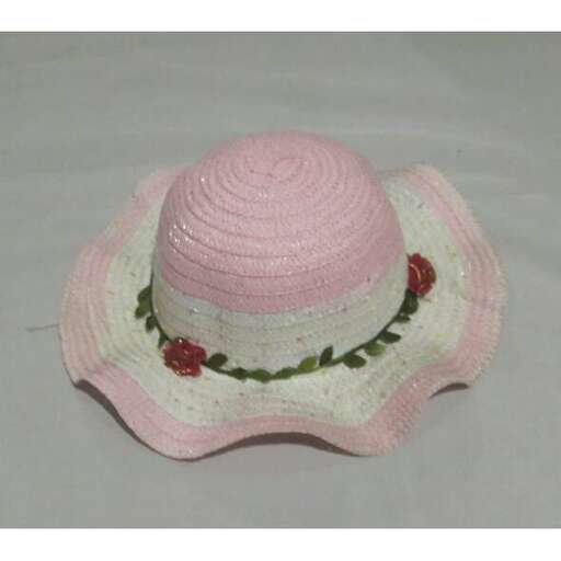 pink hat with green leaves and red flowers.
