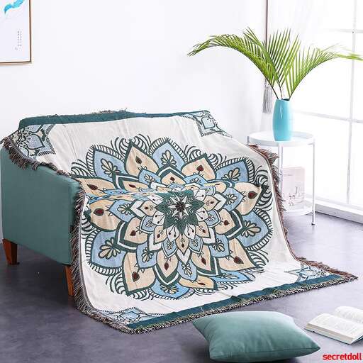 a bed with a floral design on it.