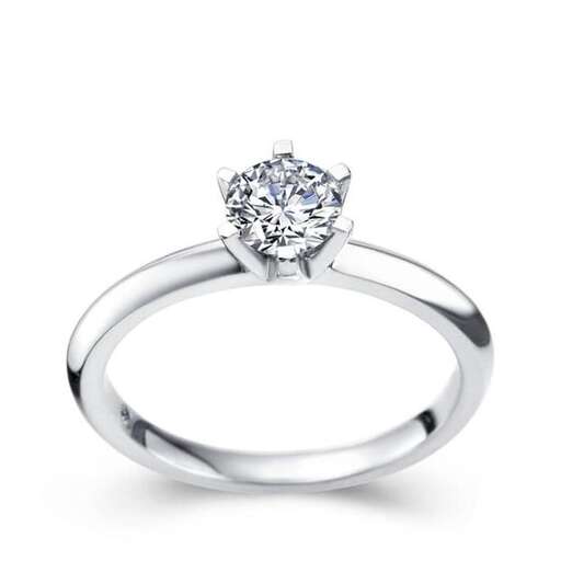 this is a platinum engagement ring with a diamond.