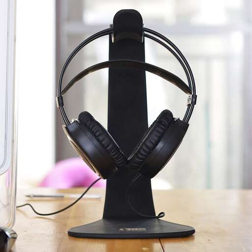 a pair of headphones sitting on a table.