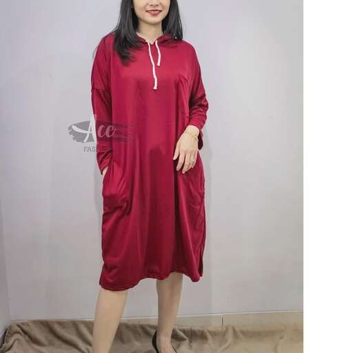 garment is a long sleeved dress with a long skirt and a long skirt.