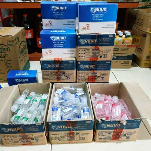 boxes of water and supplies are stacked on top of each other.