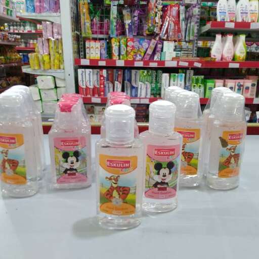 a store with a lot of bottles of soap on the counter.