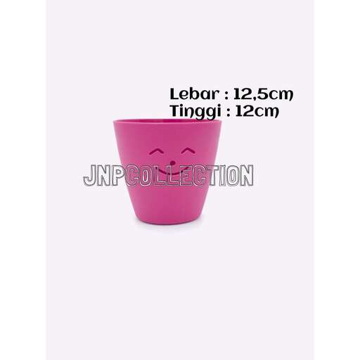 smile in a pink cup