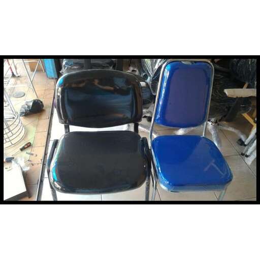 a chair that is sitting in a room.