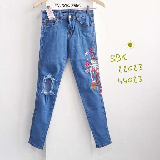 a pair of jeans with a floral print.