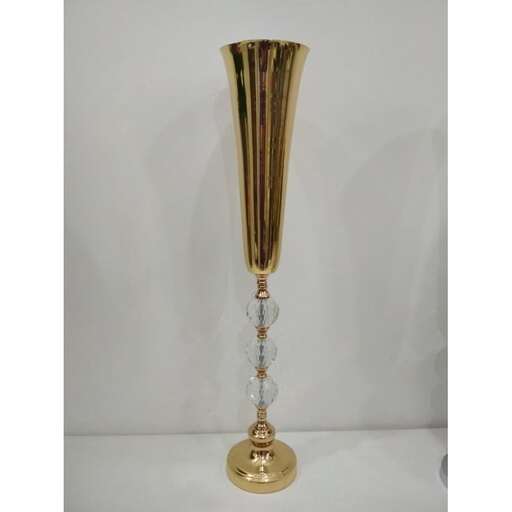 person, a pair of brass lamps