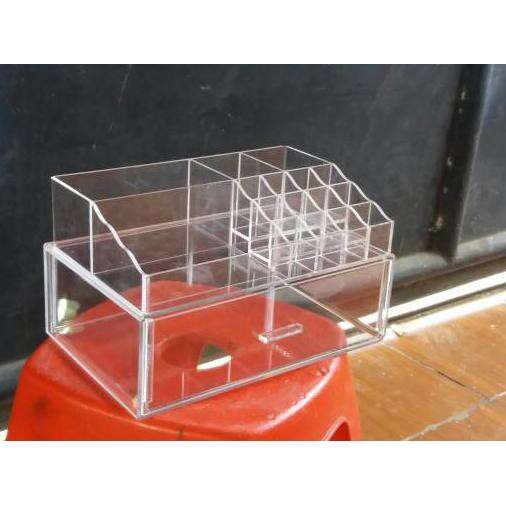 a wire basket with a glass top.