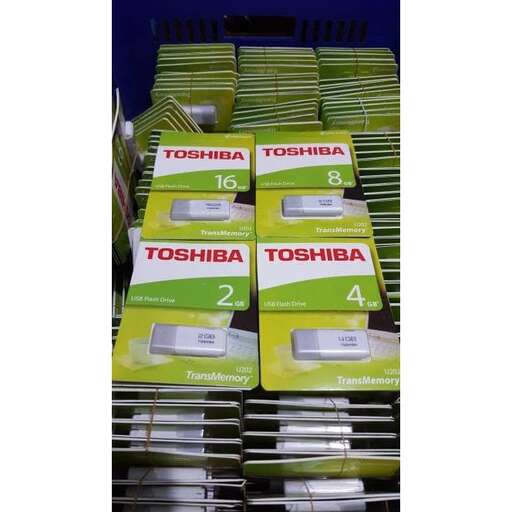 a stack of boxes with a cell phone on them.