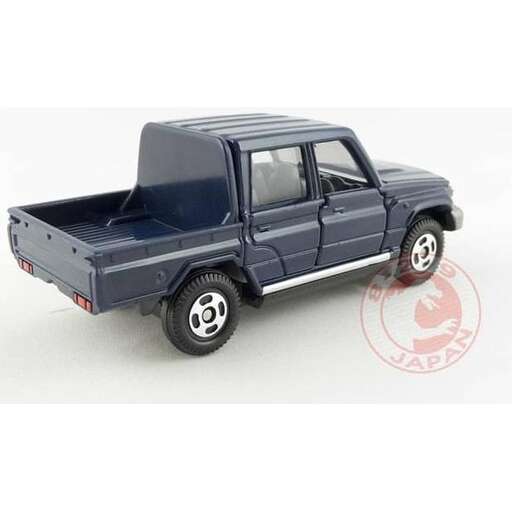 a blue pickup truck with a black roof and a white sign on the side.