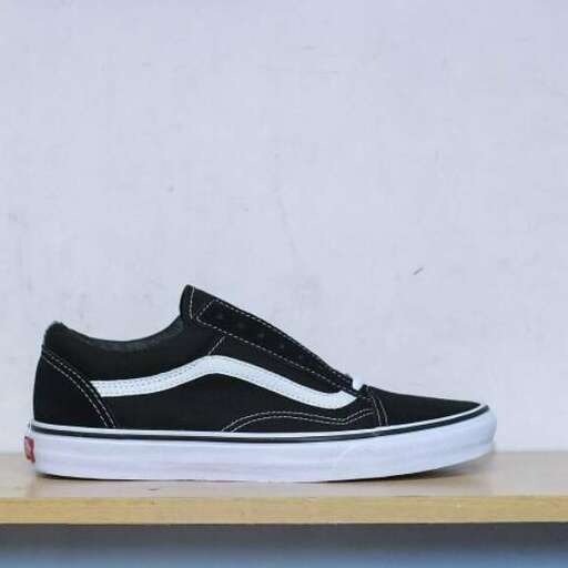 a pair of black and white sneakers