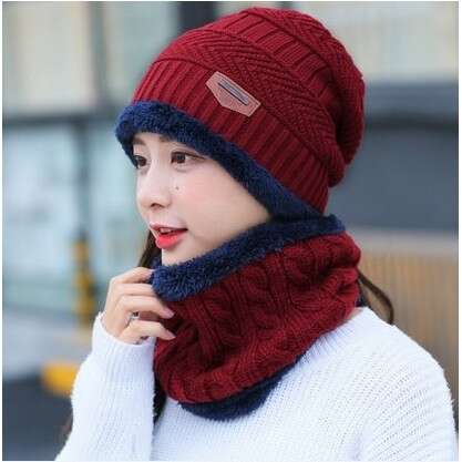 a knitted hat with a knitted scarf.