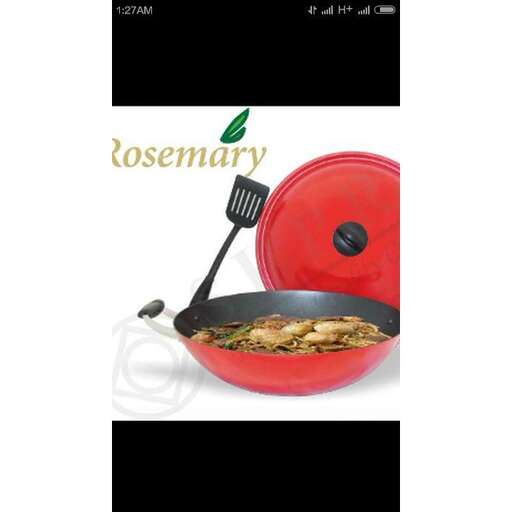 a pot of food with a spoon and a spoon