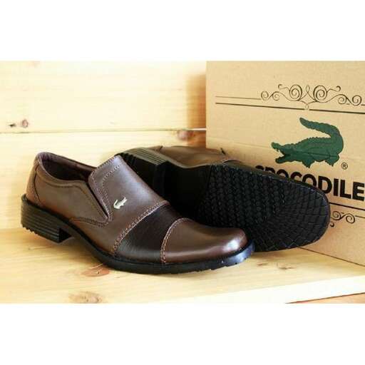 a pair of shoes that are on a box.