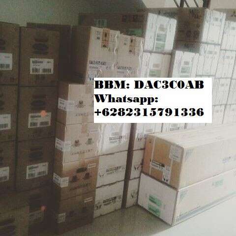 a stack of boxes sitting on top of a pile.