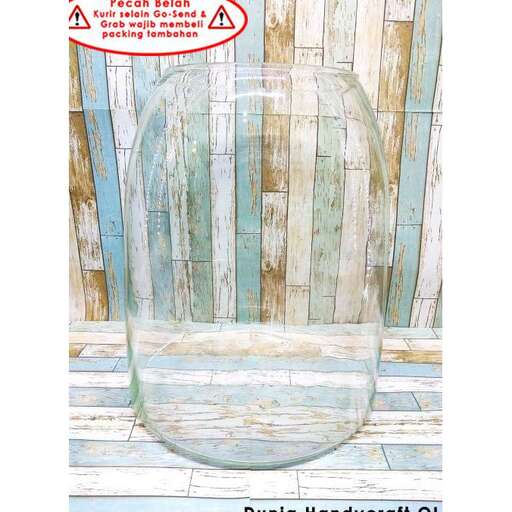 a glass vase with a wooden frame.