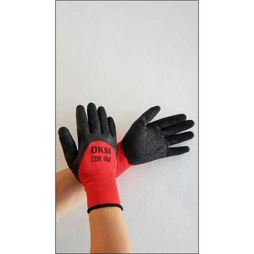 a woman's hand with a red glove on it.