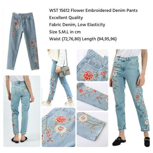 a pair of blue jeans with a floral design.