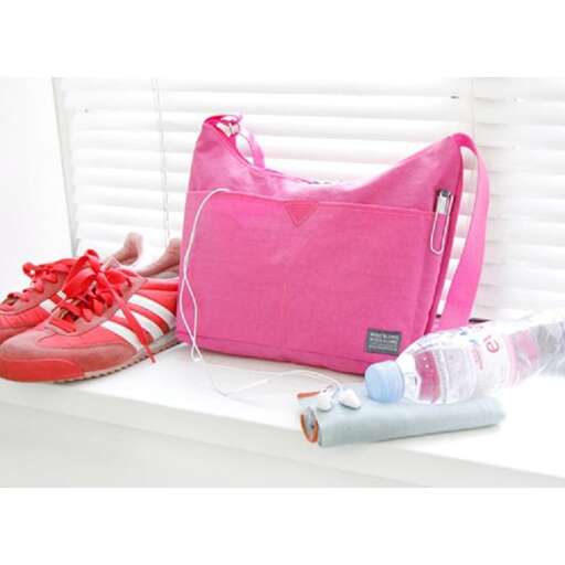 a pink bag with a pink shoe on it.