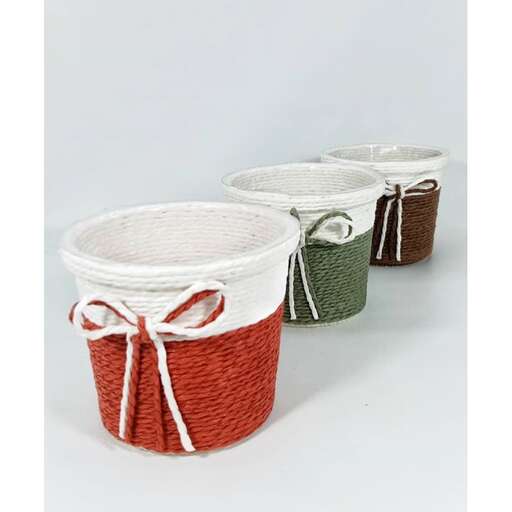 a set of three tins with a ribbon bow.