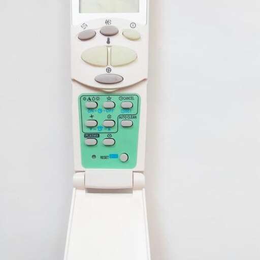 a scale with a green calculator on it.