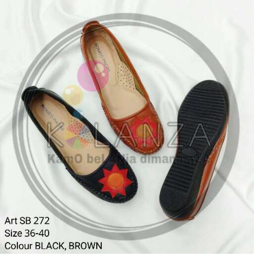 a pair of red and black shoes with floral designs