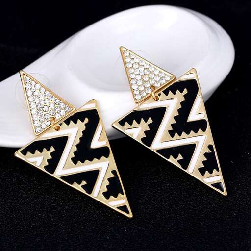 a pair of earrings with a geometric design.