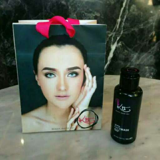 pop artist with a black bottle