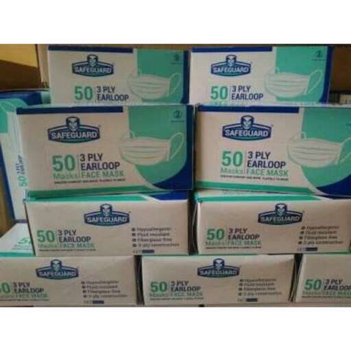 a stack of boxes of clean products.