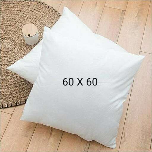 a pillow with a candle on top
