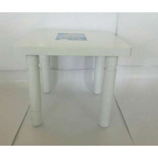 a small table made from a white table and chairs.