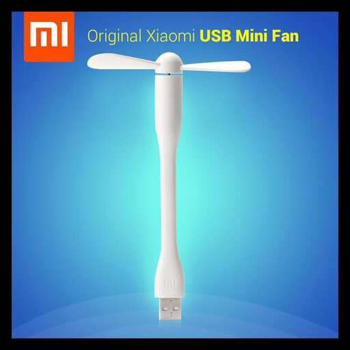 a white electric toothbrush with a blue background