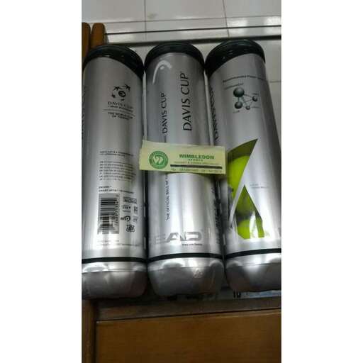 a group of cans that are on a shelf.