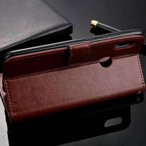 the wallet is made from leather and is a beautiful leather.