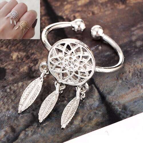 a sterling silver bracelet with a flower design.