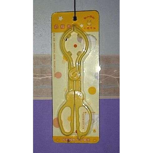 a decorative clock with a handle.