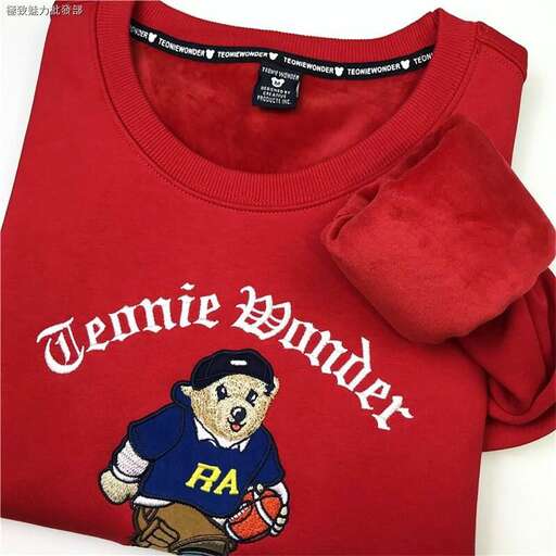 i love the idea of having a t - shirt with the name of the baseball team.