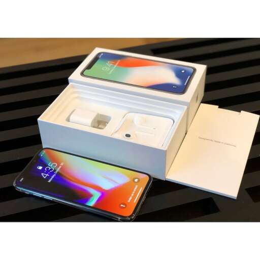 a new iphone box with a new iphone inside.