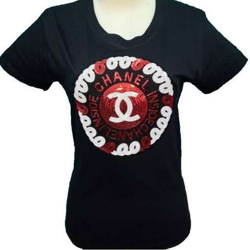 t - shirt with a round logo on the front.