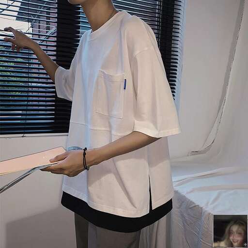 a woman holding a pair of scissors in her hand.