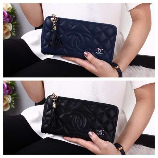 the black leather handbag with a flower design.
