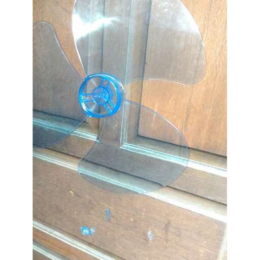 a broken glass door in the art studio.
